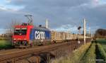 482 041-1 rollt kurze Zeit spter mit einem Holzzug vom Lbecker Konstinkai durch Reinfeld Richtung Hamburg.