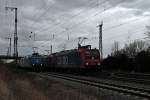 Überholung am 28.02.2014 von SBB Cargo Re 482 005-6 mit ihren neuen Augen und ihrer Schwester Re 482 019-7 und einem Kesselwagenzug in Müllheim (Baden) von der Alpha Trains/Crossrail 185