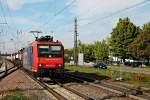 Durchfahrt am 17.04.2014 von SBB Cargo Re 482 013-0 mit einem Containerzug in Müllheim (Baden).