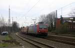 482 013-0 von der SBB-Cargo kommt aus Richtung Köln durch Eschweiler-Hbf mit einem langen Auto-Leerzug aus Safenwil(CH) nach Zeebrugge-Ramskapelle(B) und fährt in Richtung