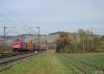 482 045-2 von SBB Cargo zieht am 17.Mrz 2015 einen Containerzug bei Himmelstadt in Richtung Wrzburg.