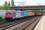 SBB Cargo/TXL Re 482 047-8 am 13.08.2014 mit einem Containerzug aus Richtung Hafen in Hamburg Harburg gen Maschen.