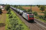 Re 482 026-2 am 22.08.2014 mit einem Kesselwagenzug bei Auggen auf der KBS 703 und fuhr in Richtung Freiburg (Breisgau).