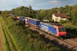 In der Abendsonne des 22.08.2014 fuhr SBB Cargo Re 482 003-1 mit einem KLV südlich von Müllheim (Baden) in Richtung Süden.