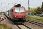 Re 482 016-3 am 05.09.2014 in Müllheim (Baden) mit einem Containerzug gen Süden.