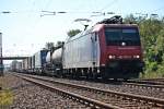 Am 27.09.2014 bespannte die Re 482 027-0 einen Containerzug, als sie durch Orschweier gen Norden fuhr.