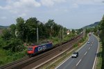 Am 22.07.2016 ist Re 482 045 von SBB Cargo mit einem Containerzug auf der Main-Spessart-Bahn unterwegs und fährt gerade in den Bahnhof Veitshöchheim ein.