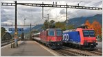 IC 929 mit Re 4/4 11164 und 482 001-5 in Landquart. (18.10.2016)