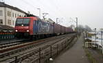 482 011-4 von ChemOil  kommt aus Richtung Süden mit einem Containerzug aus Süden nach Köln-Eifeltor(D) und fährt durch Rüdesheim(am Rhein) in Richtung Koblenz,Köln.