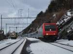 Die Re 484.014 SR war am 4.1.2007 mit dem EC 131 VAL D'OSSOLA bei Hohtenn unterwegs.An siebter Stelle dieses Zuges war ein belgischer Liegewagen eingereiht.