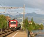 Re 484 014-6 mit CIS EC 126 von Milano nach Genf bei St-Saphorin  am 27.07.2007 