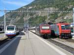 SBB - Cisalpino / Cisaolpino Triebzug Typ 470 bei der ausfahrt aus dem Bahnhof neben der SBB E-Lok 460 026-8 und der SBB E-Lok 484 017-9 in den Cisalpino Farben im Bahnhof von Brig am 20.09.2007