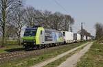 Bei Boisheim befördern die  Alpinisten  von BLS Cargo mit der 485 016 am 27.03.2020 einen Güterzug in Richtung Kaldenkirchen, aber Berge werden sie dort weit und breit nicht finden...