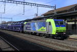 BLS - Lok 485 014-7 vor Autotransportwagen bei der durchfahrt im Bhf. Sissach am 02.03.2024