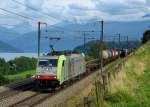 Re 486 509 mit einem Containerzug am 01.09.2011 bei Einigen.