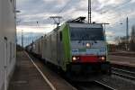 Am 17.01.2014 fuhr BLS Cargo Re 486 508 mit dem 42012 (Melzo - Wanne-Eikel) und der MRCE ES 64 F4-112 am Zugschluss durch den Bahnhof von Müllheim (Baden) auf das Überholgleis gen Norden.