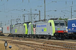 Doppeltraktion, mit den Loks 486 503-6 und 485 014-5, durchfahren den Badischen Bahnhof.