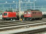 Ae 6/6 11424 mit Zierstreifen am 07.07.07 in Buchs/SG.Ganz links BB Taurus Lok 1116 204-7