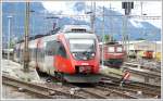 4024 073-1 fhrt aus Buchs SG aus Richtung Feldkirch. Rechts davon Ae &/6 11423. (10.07.2007)