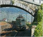 Ae 6/6 11478 mit einem kurzen Gterzug bei Cully am 22. Sept. 2008