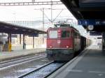 SBB - Schnappschuss der Ae 6/6 11466 vor Gterzug bei der Durchfahrt im Bahnhof Yverdon am 19.12.2009