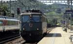 Die Ae 6/6 11514  Weinfelden  durchfhrt am 11.07.11 den Bahnhof Liestal.