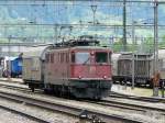 SBB - Gterzug mit Ae 6/6 11430 mit Gterwagen im Bahnhofsareal von Erstfeld am 08.05.2012