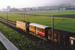 SBB/BVZ/MGB: Ein BVZ-Mitteleinstiegwagen unterwegs im letzten Abendlicht zwischen Selzach und Bettlach im Sommer 1995.