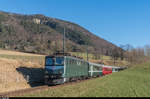 Ae 6/6 11421  Graubünden  fährt am 10. Dezember 2016 mit der SBB Historic Samichlausfahrt von Olten nach Delémont zwischen Corcelles BE und Crémines in Richtung Moutier. 
Der Zug besteht aus den beiden ehemaligen Bundesratswagen AS 2801 und AS 2802, einem weiteren Salonwagen SR 2302 und dem Speisewagen WR 702.