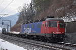 Re 620 034-9  Aarburg-Oftringen  zieht am 01.03.2018 auf der Bözberg Südrampe bei Schinznach Dorf ihren Güterzug in Richtung Süden.