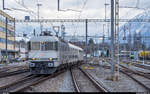 Railadventure Re 6/6 11603 mit zwei Kupplungswagen am 19. Januar 2020 auf dem Weg von Zweisimmen nach Basel bei der Durchfahrt in Thun.