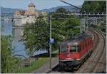 Bildfüllend zeigt sich das Château de Chillon und die nummernletzte SBB Re 6/6 11689 (Re 620 089-3)  Gerra Gambarogno  am Genfersee.