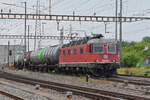 Re 620 025-7 durchfährt den Bahnhof Pratteln.