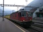 Re6/6 11618 mit einem Postcontainerzug in Erstfeld.