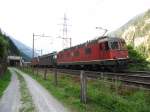 Re 6/6 mit Ae 6/6 und Re 4/4 II im Schlepp bei Gschenen am 16.07.2010