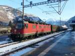 SBB - Re 6/6  11604 vor Gterzug im Bahnhof Visp am 30.12.2010