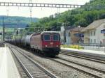 SBB - Re 6/6 11653 mit Gterzug bei der durchfahrt im Bahnhof Sissach am 15.06.2012