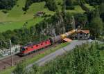 Eine Re 6/6 mit einem Gterzug am 29.08.2012 unterwegs bei Wassen.