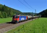 Re 620 051 mit einem Kesselzug am 27.08.2012 bei Tecknau.