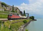 Re 6/6 11621 mit einem Güterzug am 17.06.2014 bei Rivaz.