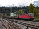 SBB - Re 6/6  11620 vor Güterzug bei der durchfahrt im Bahnhof Gwatt am 10.10.2014