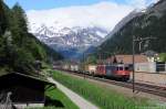 Re620 087 + Re4/4'' 11341 mit Güterzug am 11.05.2013 bei Ambri-Piotta