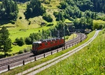 Re 6/6 11613  Rapperswil  kehrt von einer Schubleistung nach Erstfeld zurück.