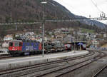 Militärtransport per Bahn.
Impressionen von Moutier.
Re 620 076-0  ZURZACH  mit dem Panzerzug 69030 Courtemaîche - Rangierbahnhof Biel in Moutier am 4. März 2019. Transportiert wurden 2 Pz87 Leo WE sowie 8 Spz 2000.
Bildausschnitt Fotoshop.
Foto: Walter Ruetsch