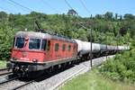 Re 620 040-6  Münchenstein  zieht einen Kesselzug in Richtung Basel. Aufgenommen am 08.06.2019 bei Villnachern AG.