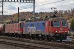 Re 620 051-3  Dornach-Arlesheim  zusammen mit Re 6/6 11621  Taverne-Torricella  bei der Ausfahrt aus Brugg AG am 27.11.2019.