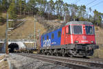 Re 620 039-8  Murten  hat soeben den Villnachern-Tunnel in Richtung Basel verlassen, aufgenommen am 24.02.2021.