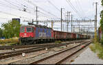 Mit offenen Güterwagen ist Re 620 069-5  Hägendorf  im Bahnhof Pratteln (CH) Richtung Basel SBB RB zu sehen.