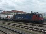 SBB Cargo 620 071-1 am 8.8.24 in Singen Hohentwiel vor einem Holcim Zug 