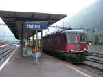 Re6/6 11618 steht am 16.08.2007 mit einem Postcontainerzug in Erstfeld.